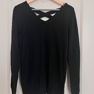 Elegant Black V-Neck Sweater with Cross Detail